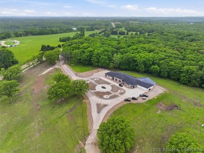 Aerial view of 2721 Highway 52 luxury estate on 30 acres in Eldon, Missouri